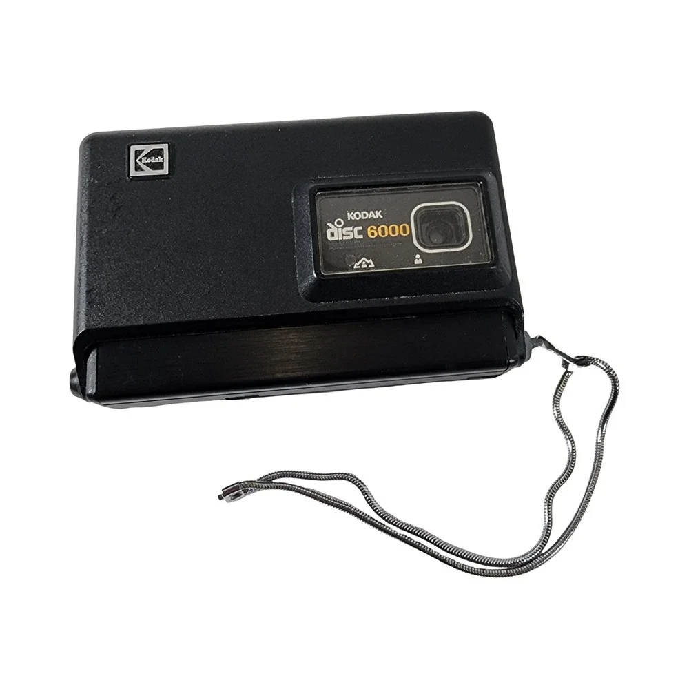 Kodak Disc 6000 Vintage Film Camera Black with Wrist Strap and Film Cartridge‎